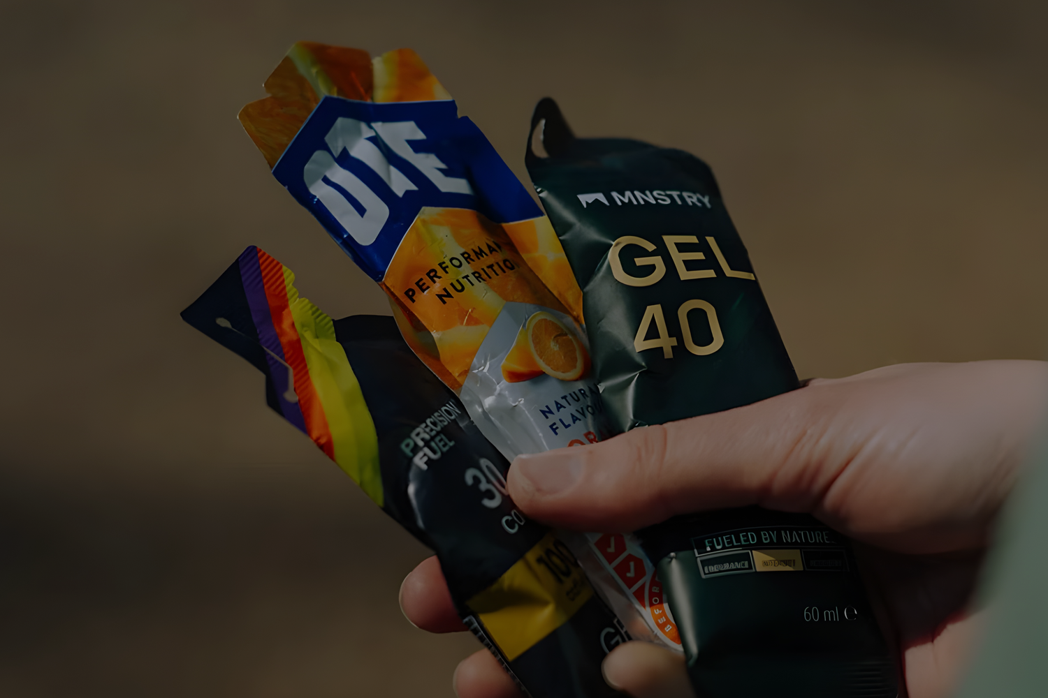 Energy gels in mans hands